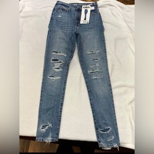 New skinny jeans with tags.